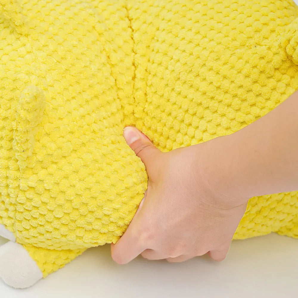 Large and medium sized plush calming dog toy with squeaker and textured chew fabric.