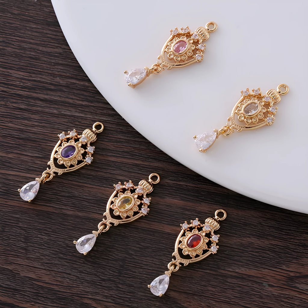 Micro inlaid zircon crown hollow water drop pendant in electroplated copper measuring 12x23mm