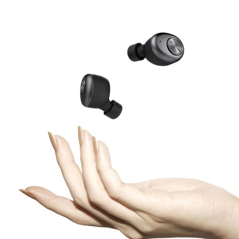 A black wireless Bluetooth single-ear headset for hands-free mobile phone calls.