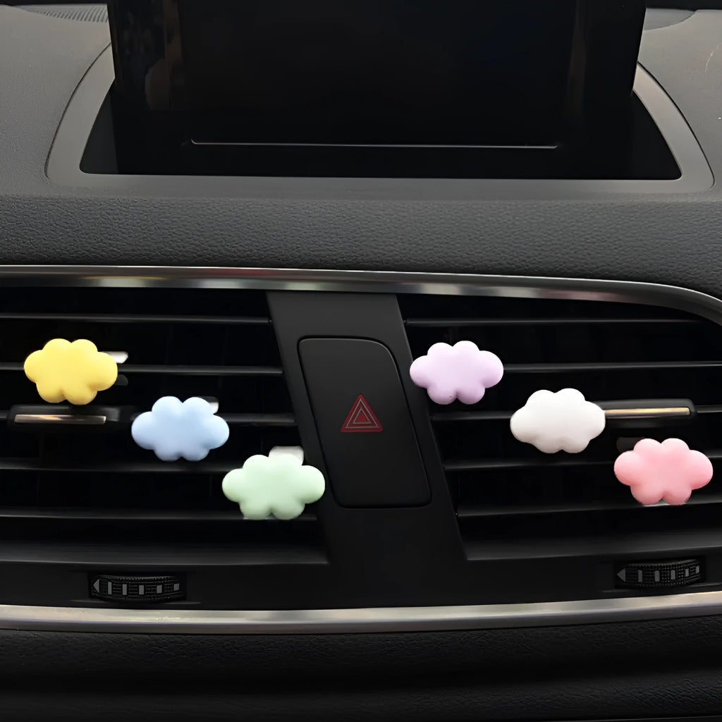 Baiyun cartoon resin car air vent fragrance clip in six colour options on a vent.