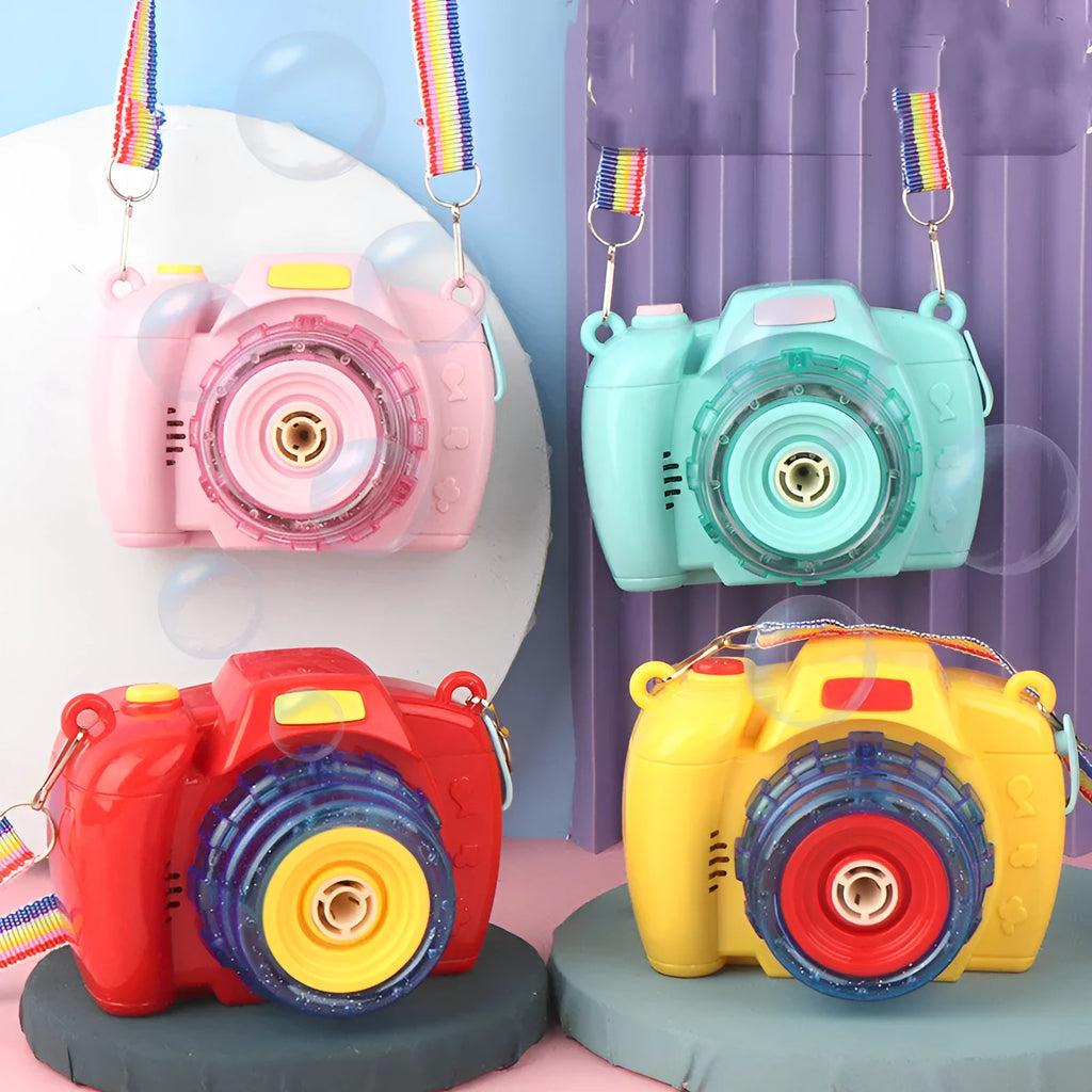 Yellow automatic camera-shaped bubble blower toy for children with flashing lights on a green lawn.