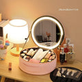 Round black PU leather makeup bag with open lid showing internal LED mirror and cosmetic partitions.
