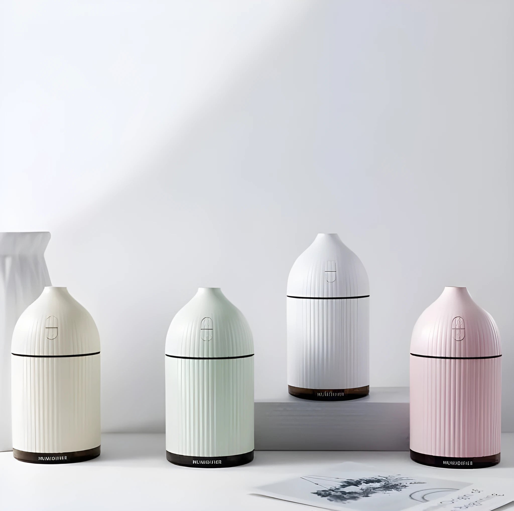 White ultrasonic aromatherapy diffuser with LED light, 300ml capacity, USB powered