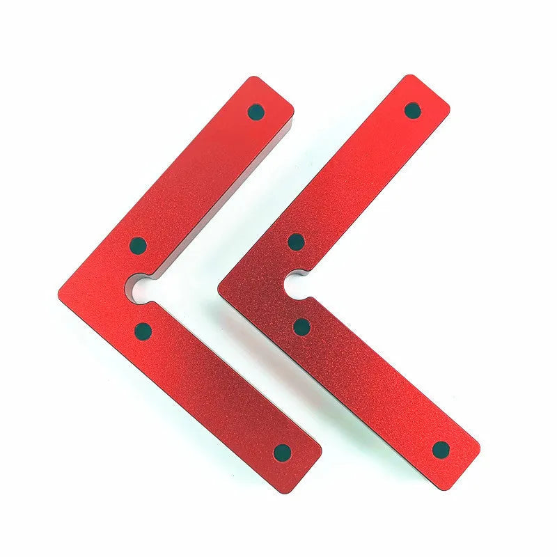 Aluminium right angle positioning block for woodworking jigsaws on a workbench