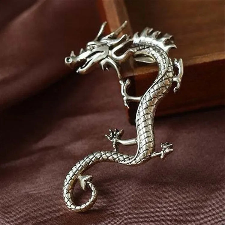 Bronze alloy dragon ear clip with electroplated finish, unisex design, size 6.5cm by 4.5cm