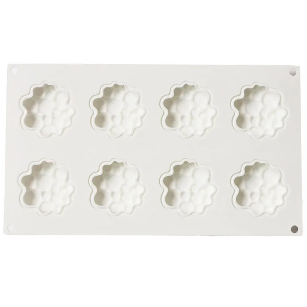 Round silicone cake mould with 8 bubble pattern design for baking and dessert preparation