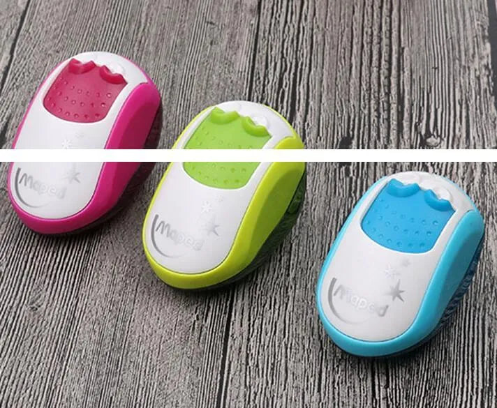 A single-hole plastic pencil sharpener in a random colour, showing its closed design.