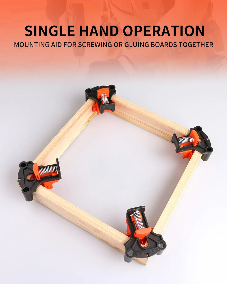 Set of four white plastic 90-degree right-angle clamps for picture frames on a workbench.