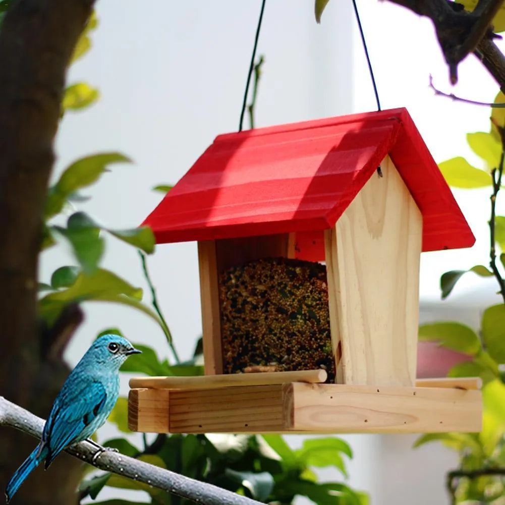 Suspended pine wood bird feeder with red roof and log texture measuring 205x165x210mm