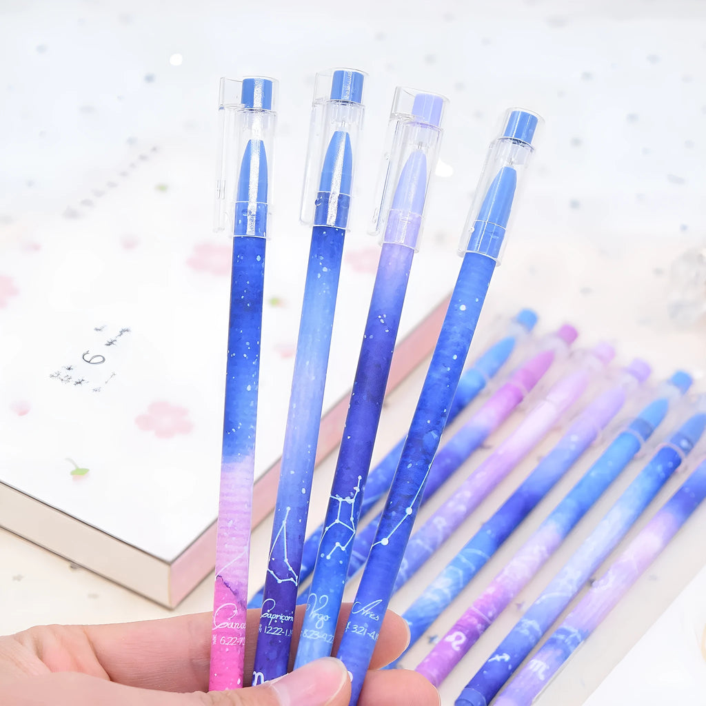 Boxed set of 12 constellation-themed quick-drying gel pens with plastic barrels.