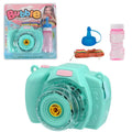 Yellow automatic camera-shaped bubble blower toy for children with flashing lights on a green lawn.