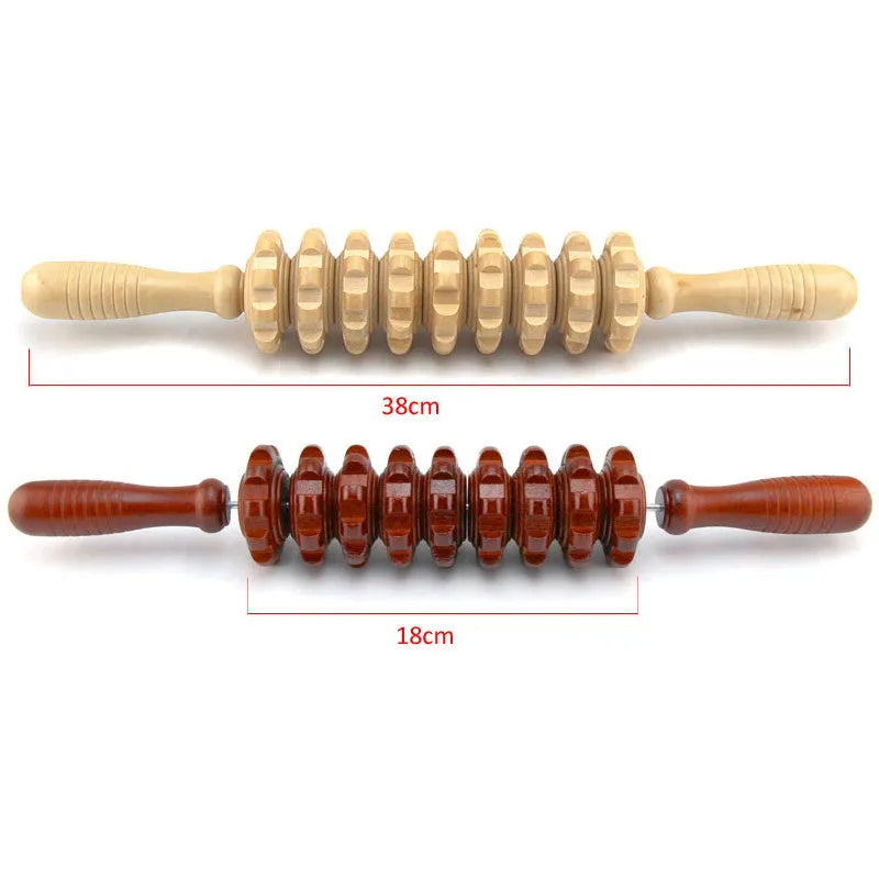 Natural wood massage stick roller approximately 38 cm long on a neutral background