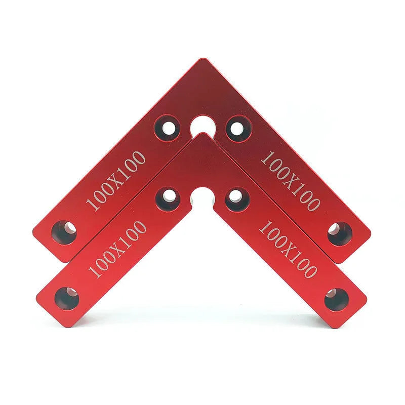 Aluminium right angle positioning block for woodworking jigsaws on a workbench