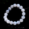 Natural blue moonlight round bead moonstone bracelet in white colour showing polished geometry-shaped beads