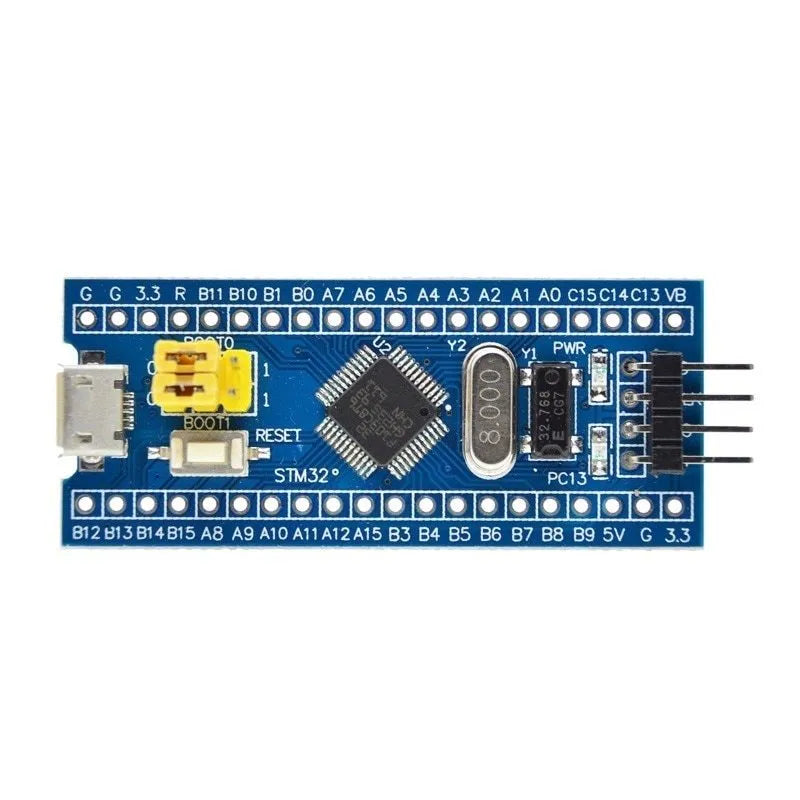 STM32F103C8T6 ARM STM32 minimum system development board module showing microcontroller chip, USB port, and pin headers.