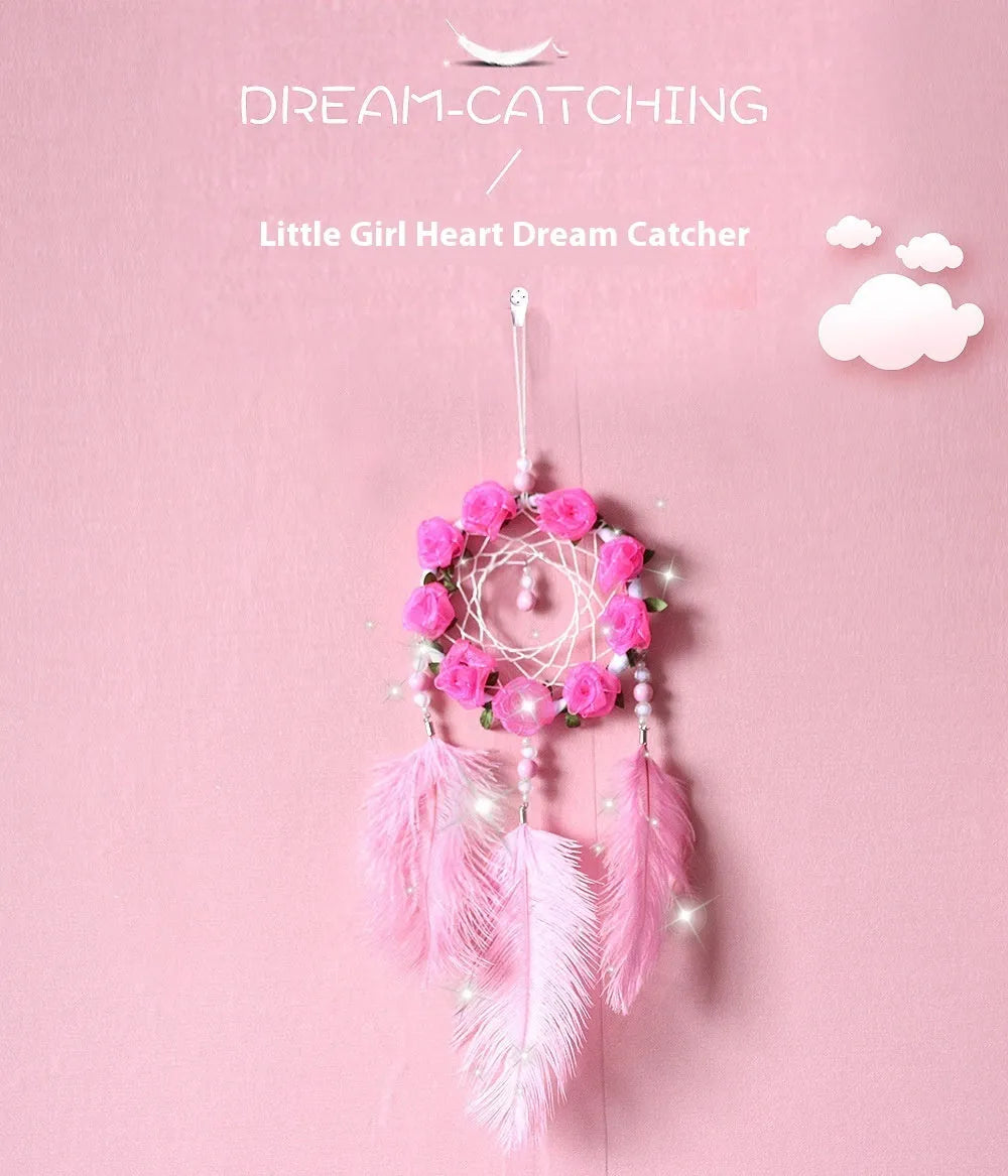 Pink dreamcatcher wind chime with ostrich feather ornaments, 10cm diameter wall decoration