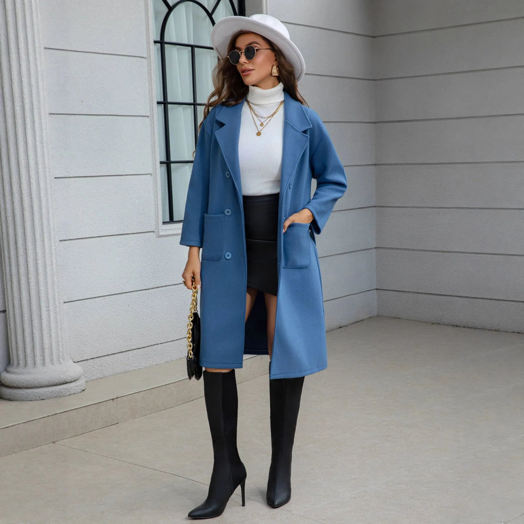 Blue waist-tie mid-length women's wool coat with patchwork pockets
