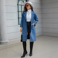 Blue waist-tie mid-length women's wool coat with patchwork pockets