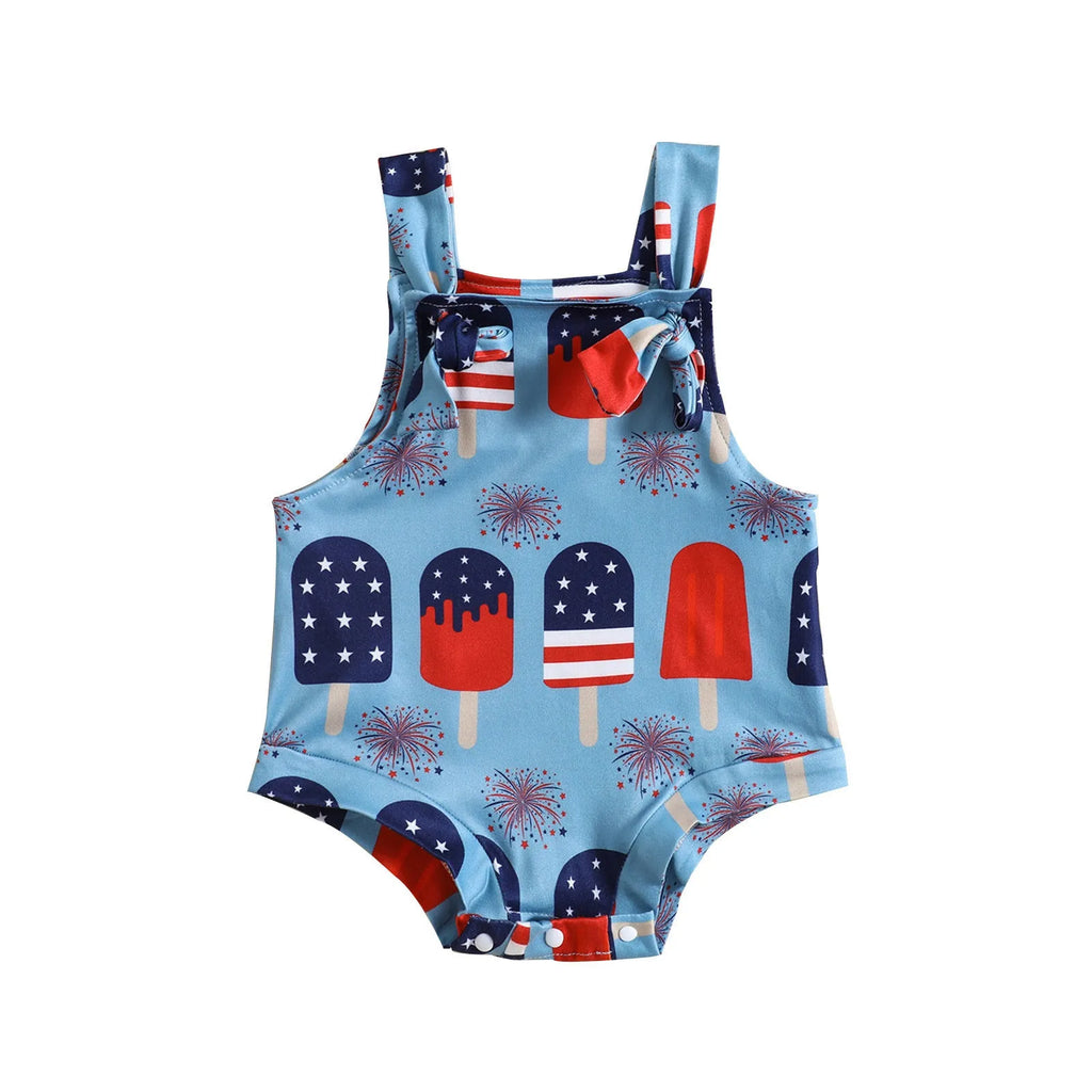 Baby girl wearing sleeveless triangle jumpsuit with front printed knotted suspenders in milk silk polyester fabric