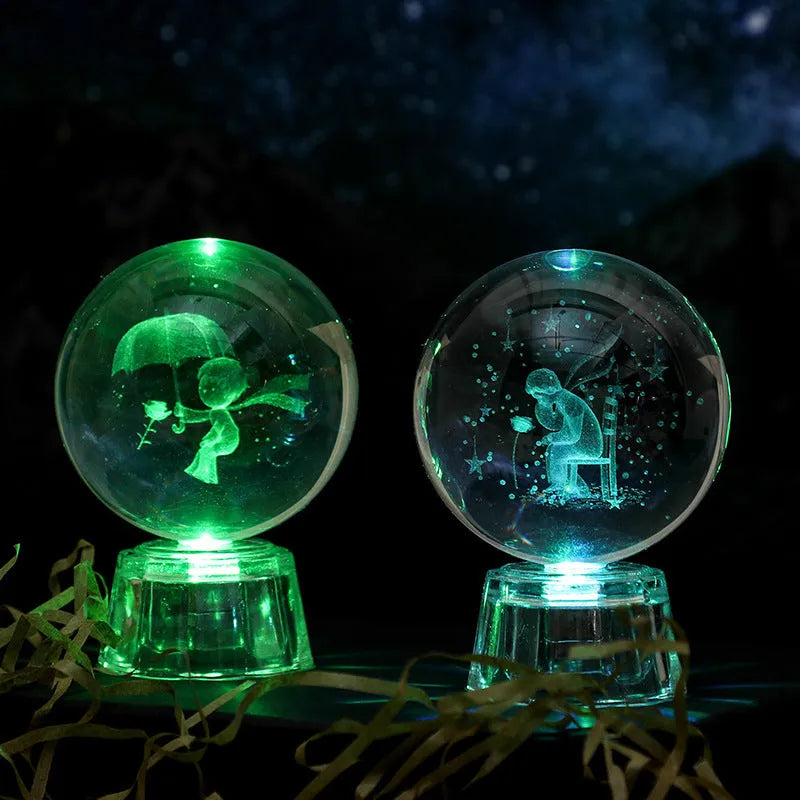 Transparent white crystal ball ornament with inner carving on a fixed base.