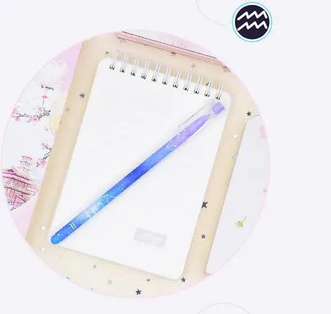 Boxed set of 12 constellation-themed quick-drying gel pens with plastic barrels.