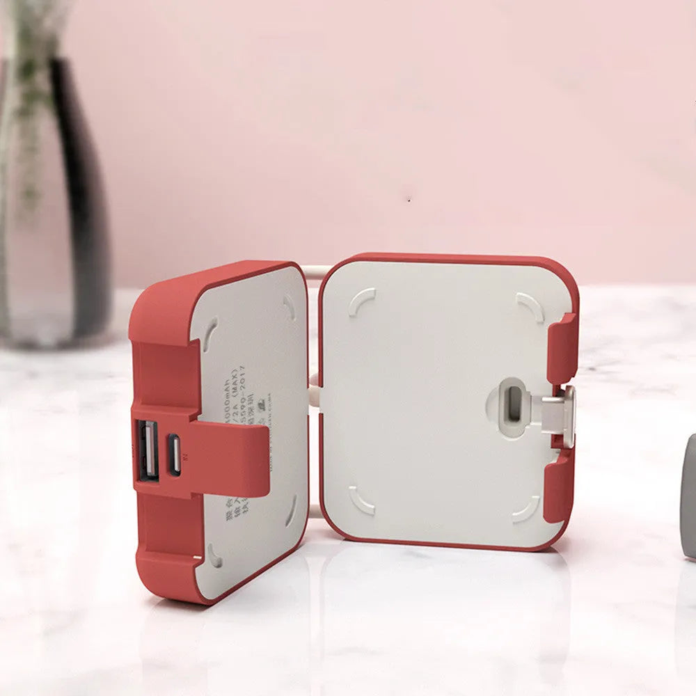Handbag clip-on power bank with phone stand function in blue, green, red, or white.