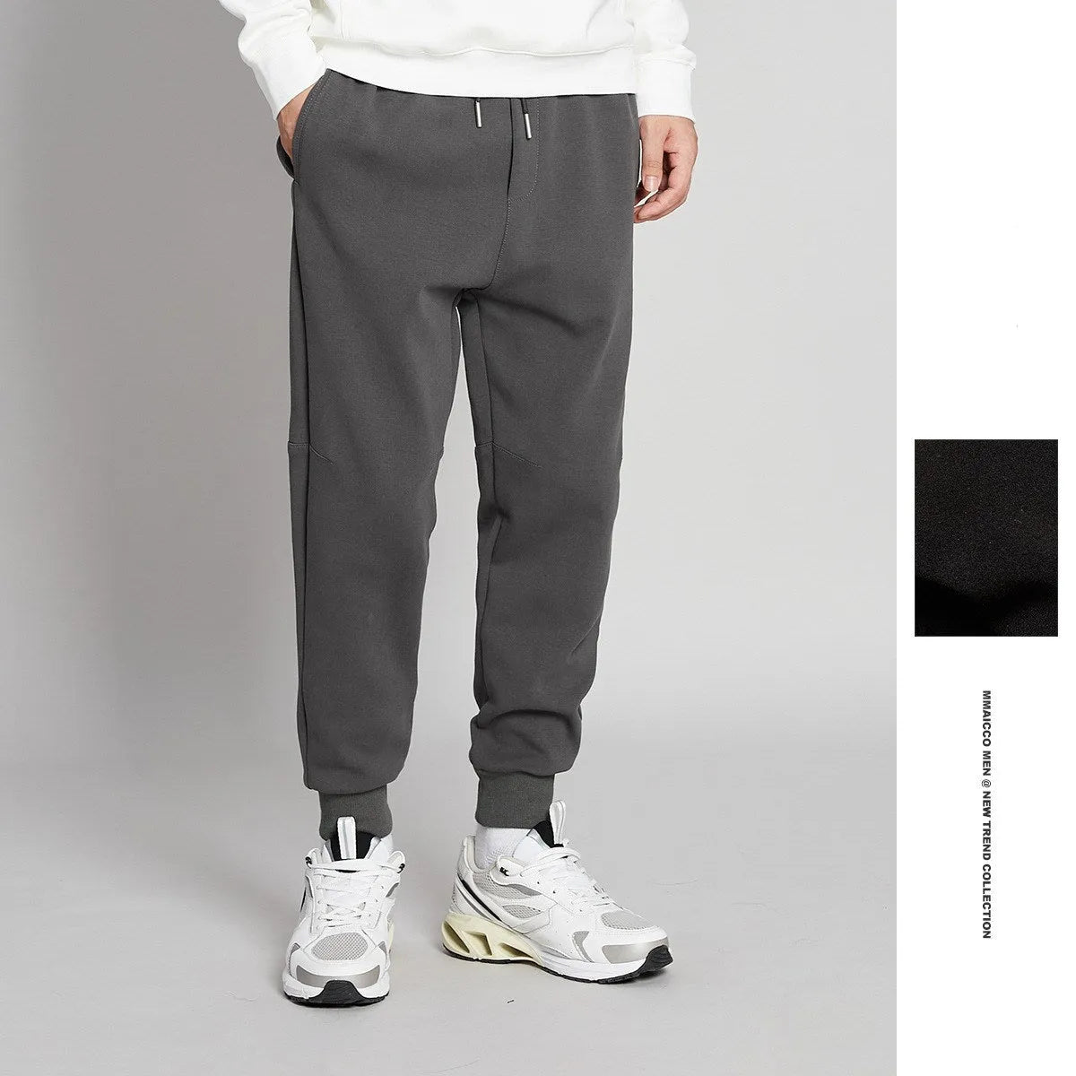 Cotton blend mid-waist drawstring loose fit nine-tenths men's casual pants in grey with tether closure