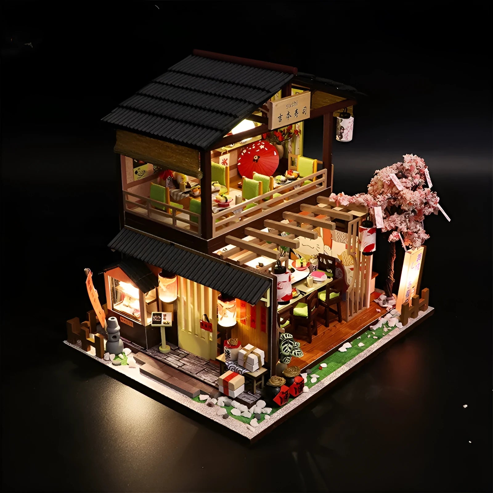 Assembled wooden Japanese sushi restaurant model with flash function, 21 by 32 by 5.5 centimetres, on a white background.