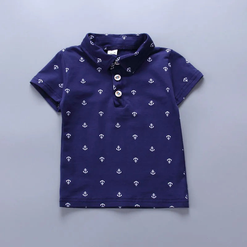 Infant anchor print cotton romper set in blue, showing short sleeves and matching trousers