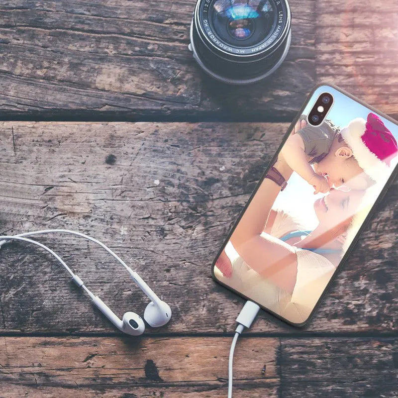 Patterned hard iPhone case with raised edge around camera lens on a table