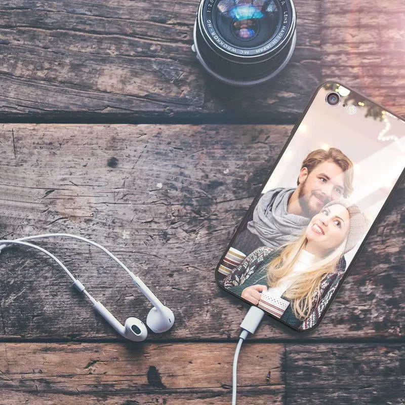 Patterned hard iPhone case with raised edge around camera lens on a table