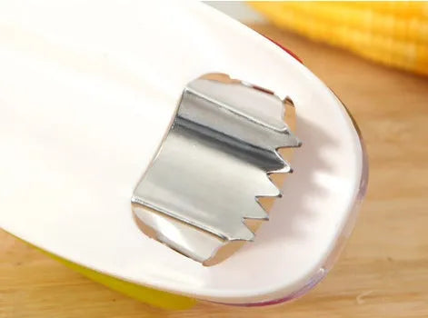 Corn stripper kitchen tool with stainless steel wavy blade and plastic handle for removing kernels from cobs