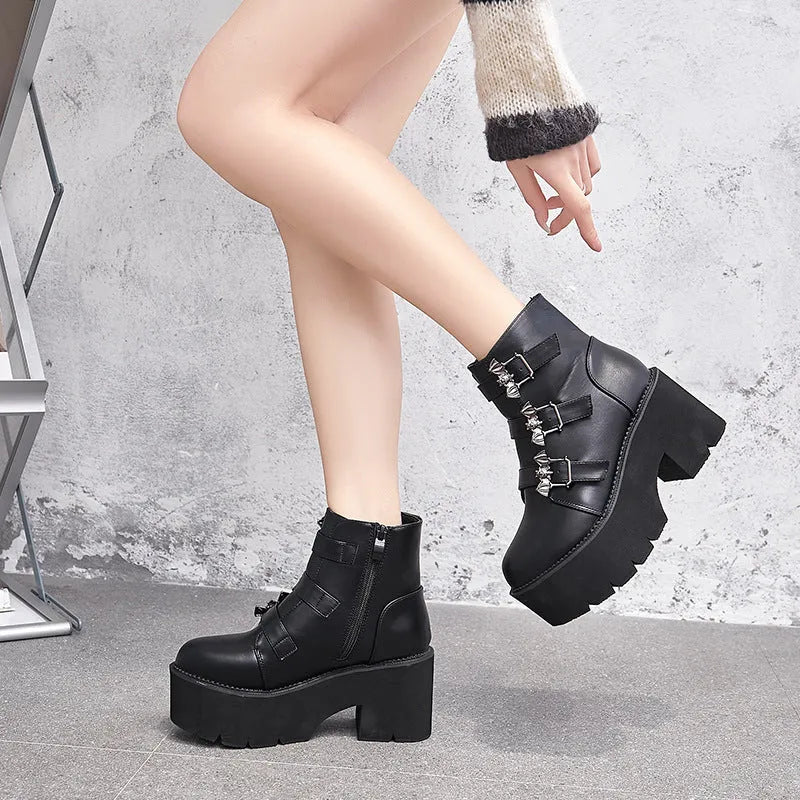 Black ladies punk Martin boots with bat buckle, thick heel, side zip, and round toe.