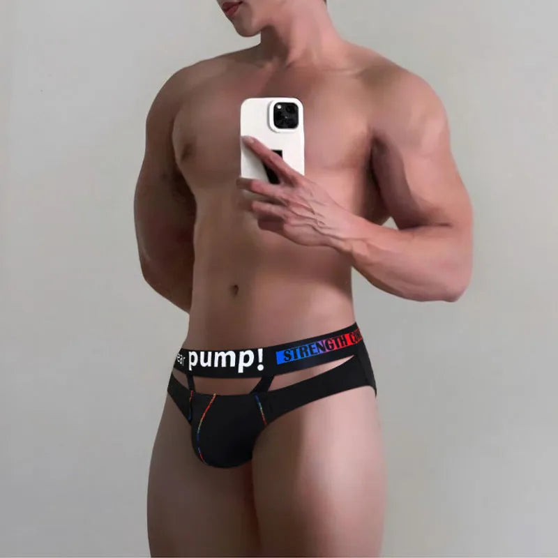 Men's solid black modal low-waist briefs laid flat