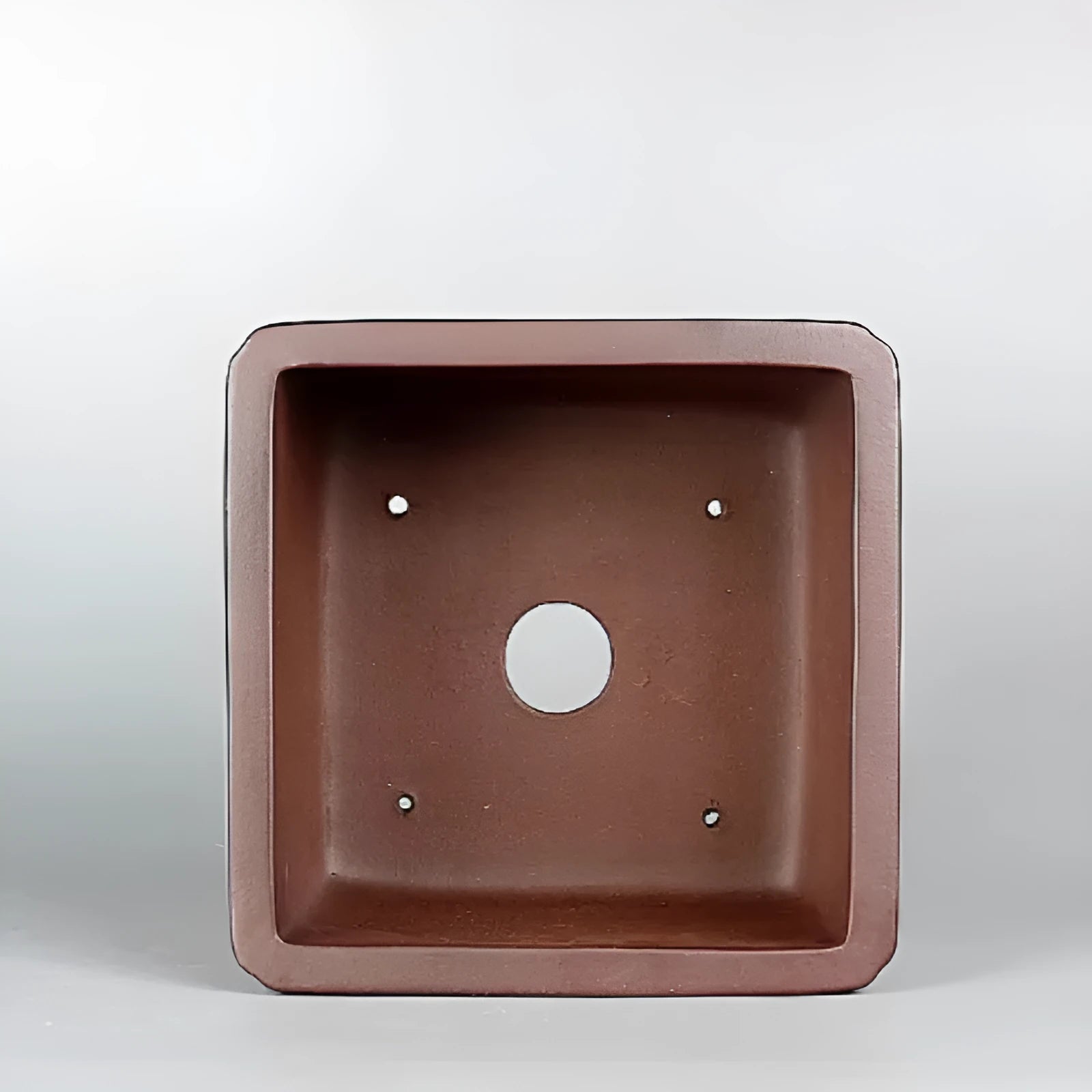 Handmade brown antique purple clay square flower pot with drainage hole.