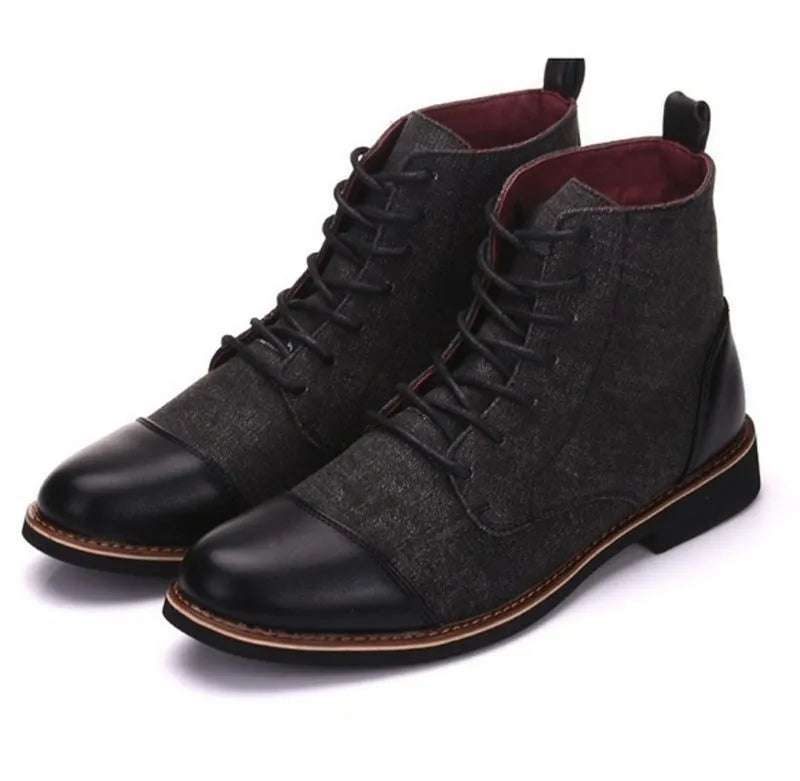 Men's black leather motorcycle boots with buckle details on a rubber sole.