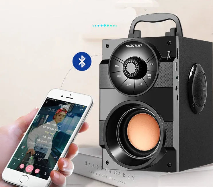 Black mini portable home audio speaker system with subwoofer and connection cable