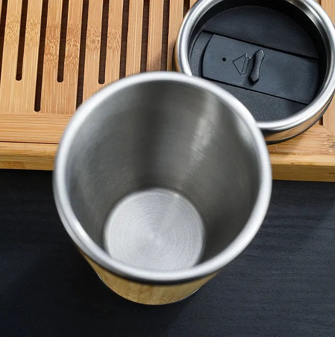 Bamboo coffee cup with double wall insulation, recyclable leak-proof lid, and anti-slip foam pad
