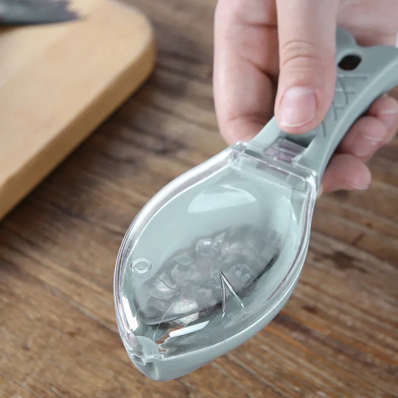 Fish scale scraper kitchen tool with cover design in food-grade white plastic with hanging hole