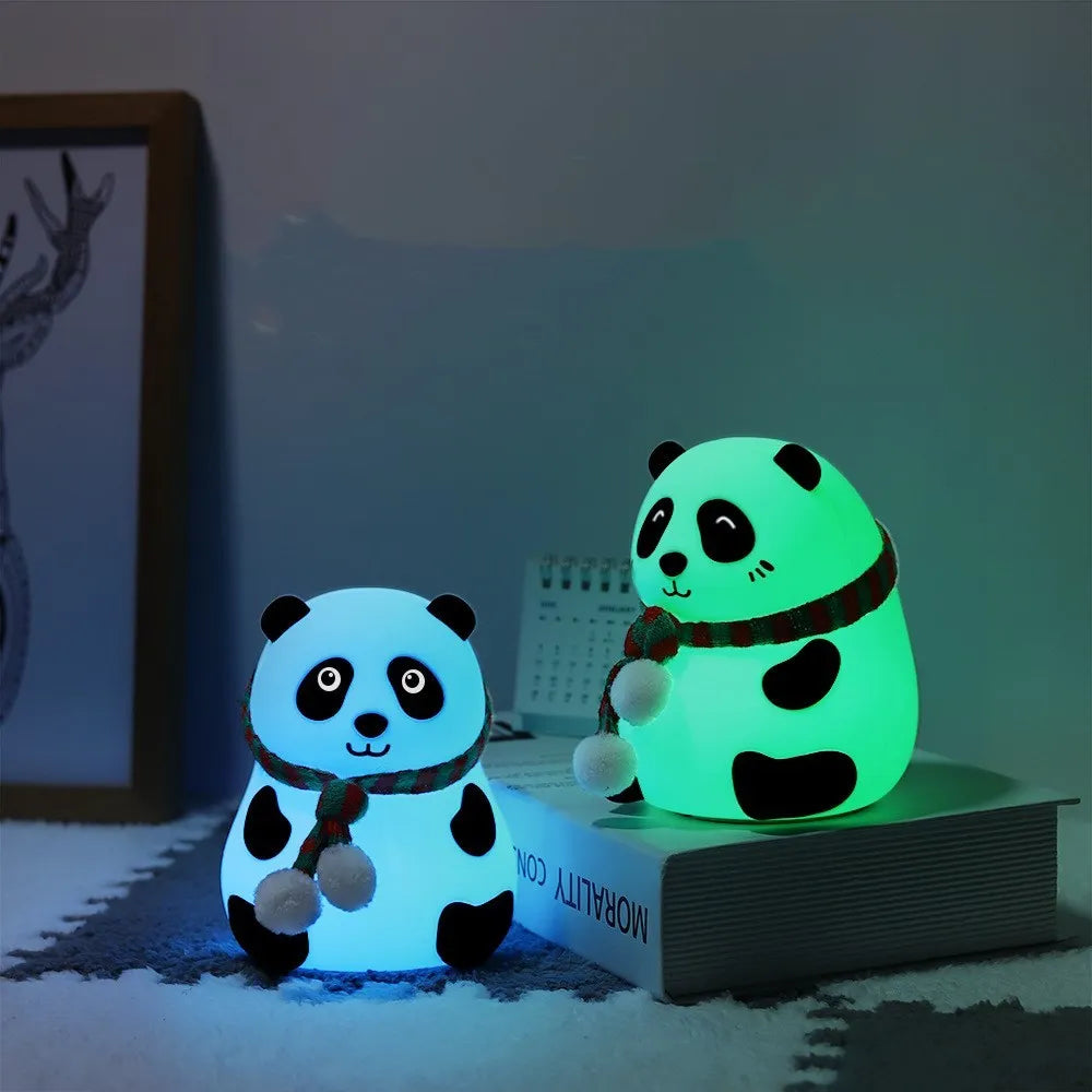 Panda-shaped silicone night light with plated decorative details and USB charging cable