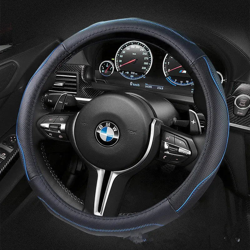 Leather steering wheel cover in beige, blue, green, grey, orange or red, fitting 37-38cm wheels, 36cm and 38cm sizes.