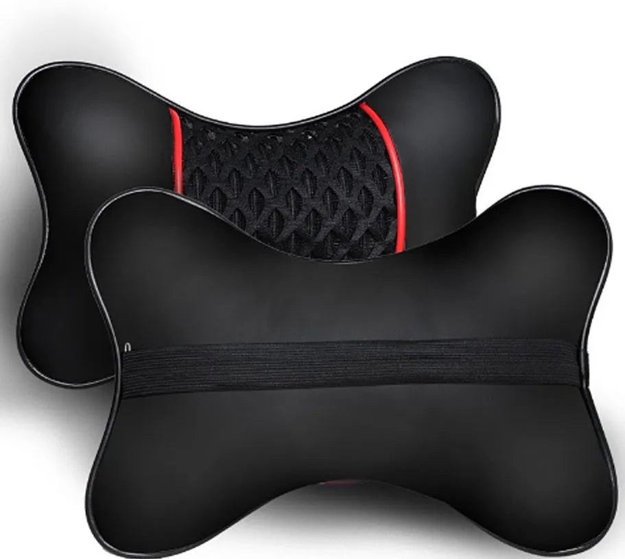 Green leather car headrest neck pillow with black red reversible colour, placed on a car seat for neck support