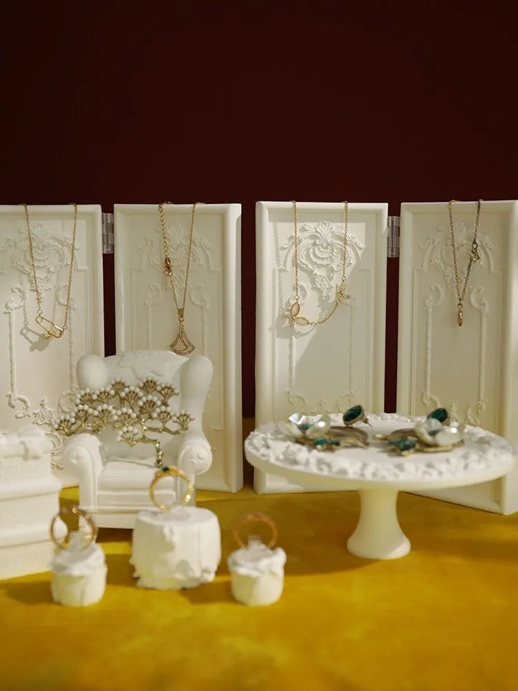 White plaster three-layer gypsum jewellery display stand with retro shape for necklaces and rings
