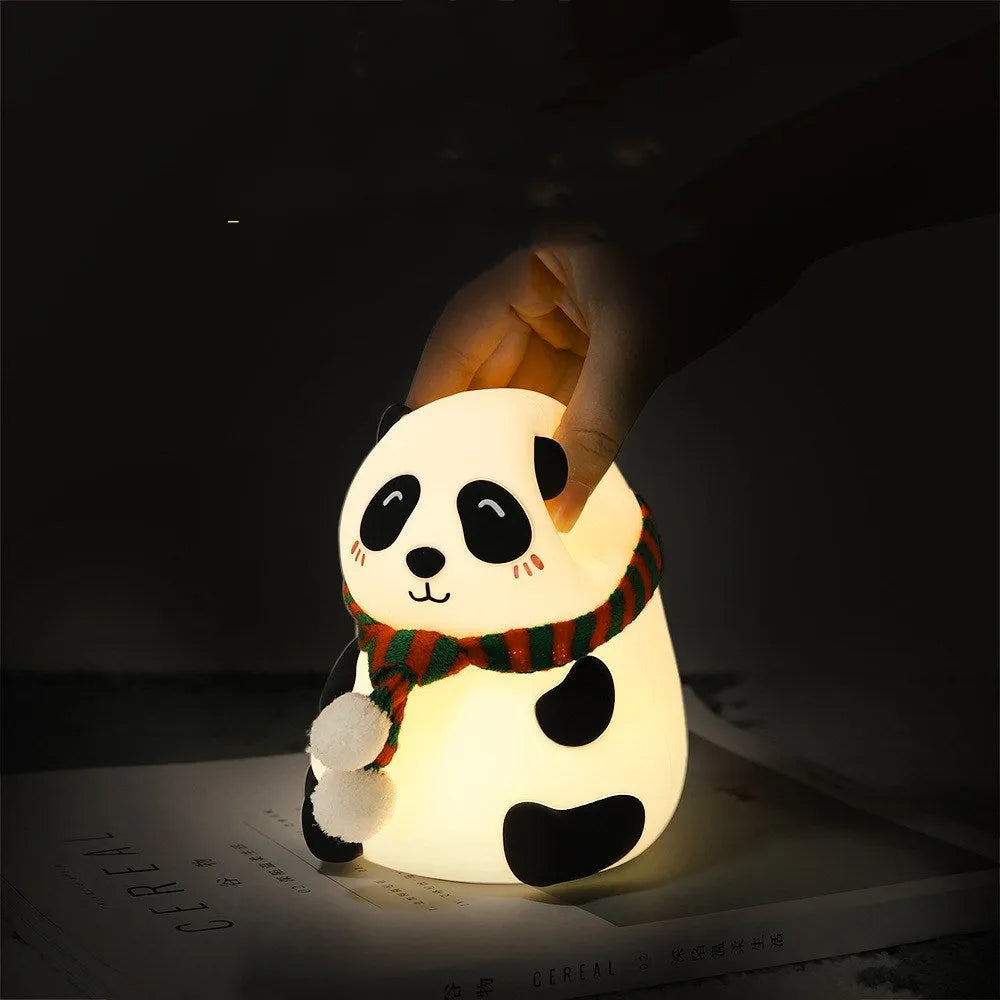 Panda-shaped silicone night light with plated decorative details and USB charging cable