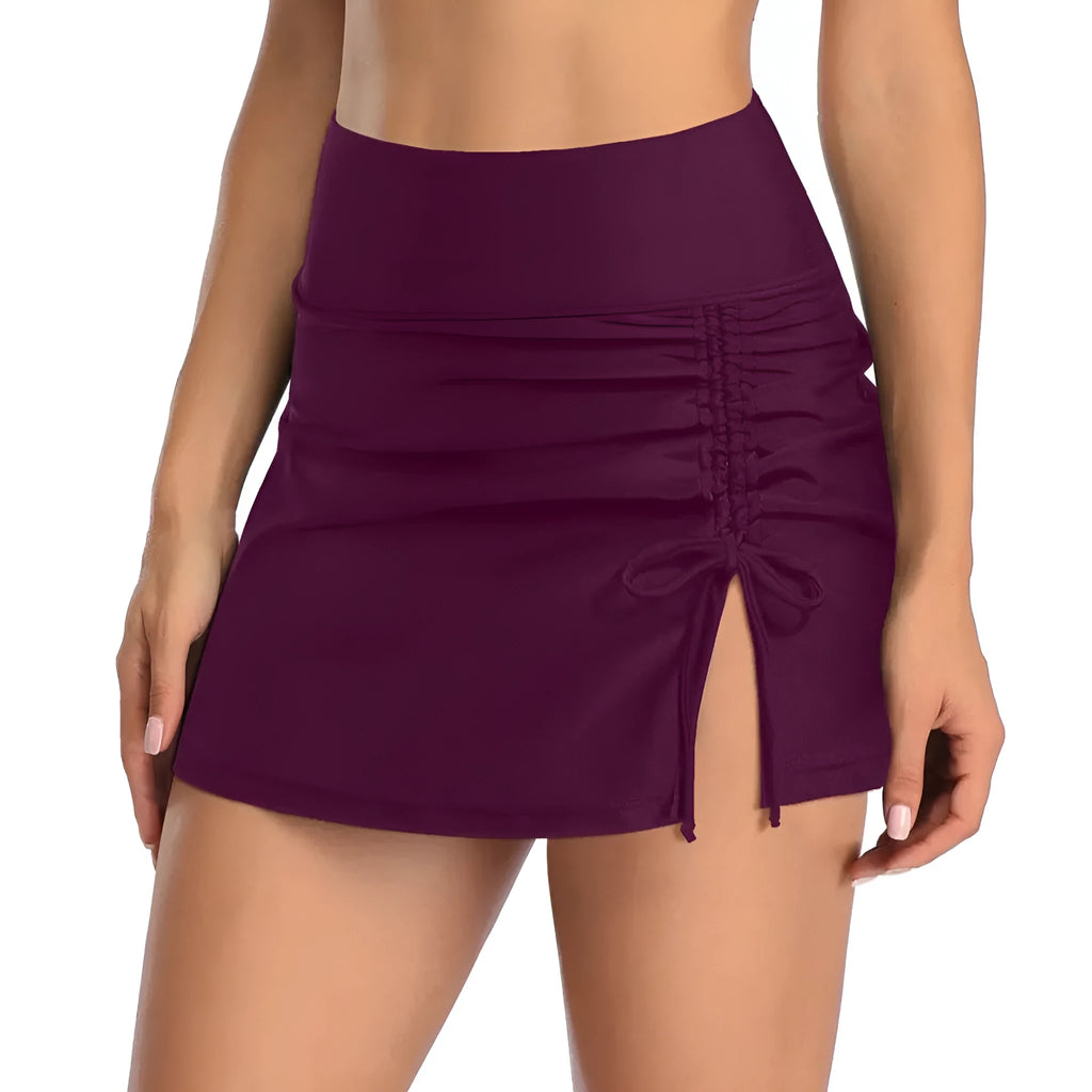 Women's solid colour swimming trunks with lace detailing in grey, shown on a hanger.