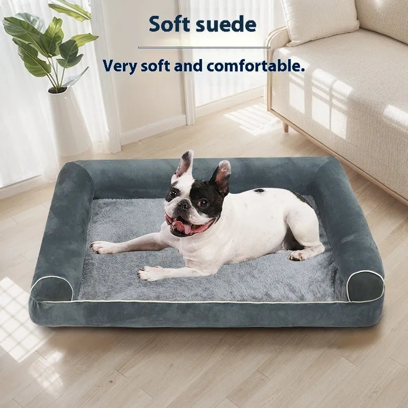 Square blue cloth dog bed with sponge filling on a wooden floor.