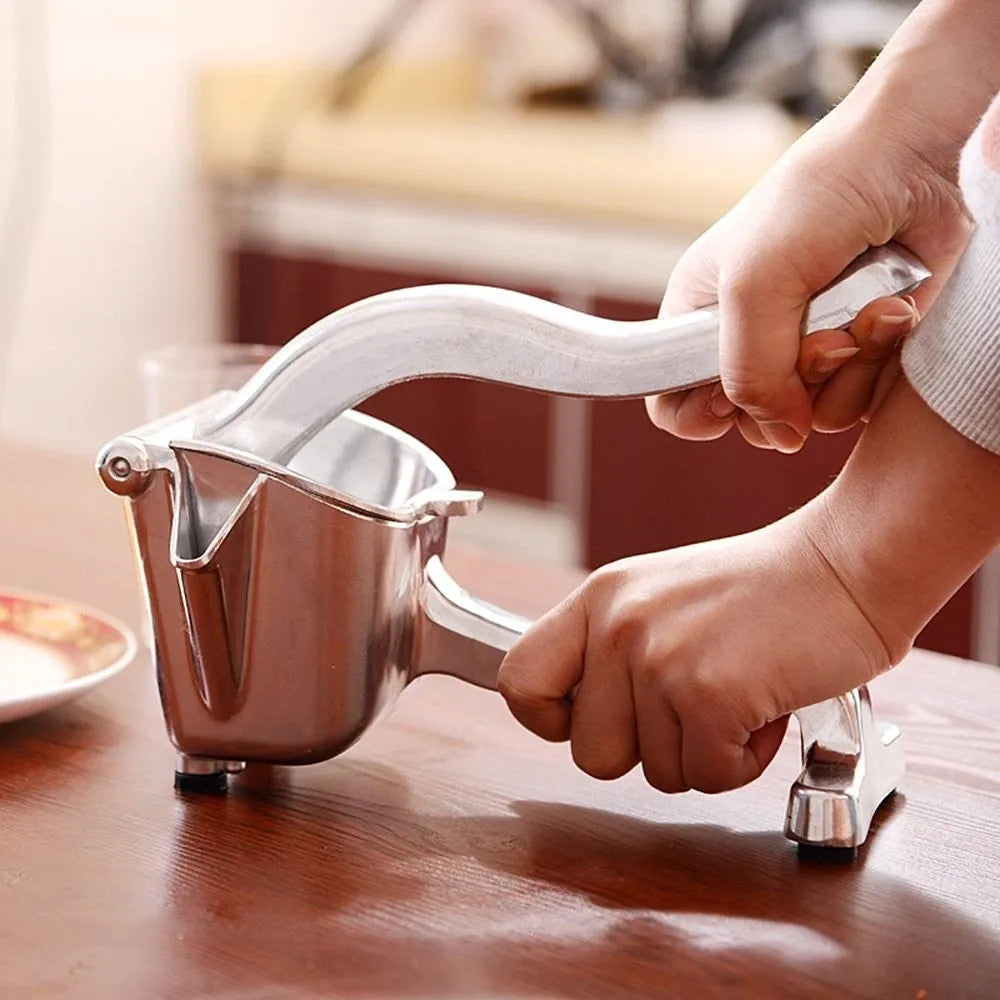 Silver aluminium and steel lemon squeezer with large bowl for whole citrus fruit