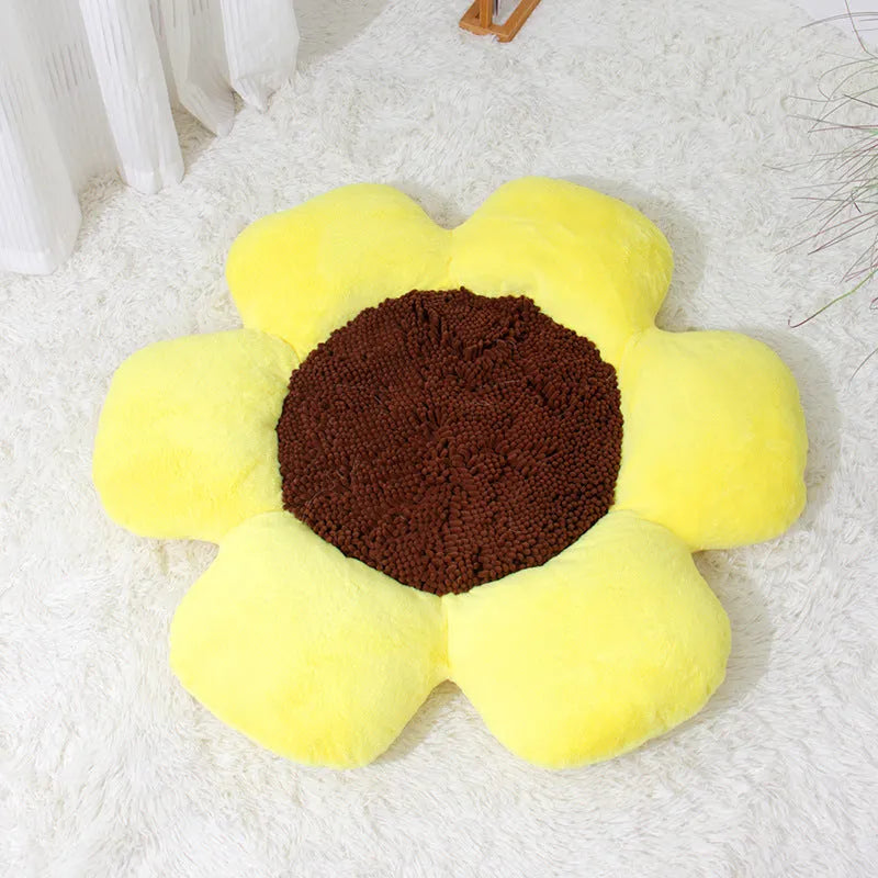 Blue round flower-shaped plush pet nest bed for cats on a wooden floor