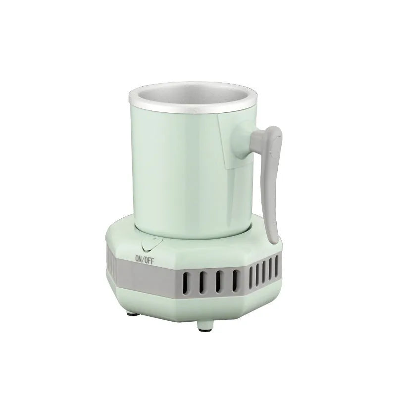 White portable mini cooling cup with base and power adapter for quick drink chilling.