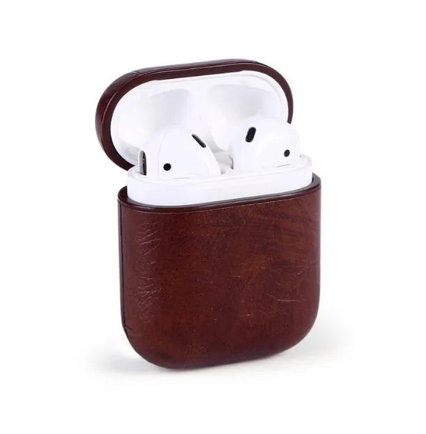 Genuine leather protective case for Apple AirPods charging case in black, brown, light brown, and red.